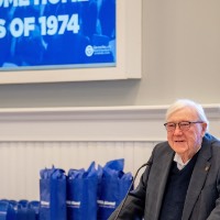 Man smiling at crowd